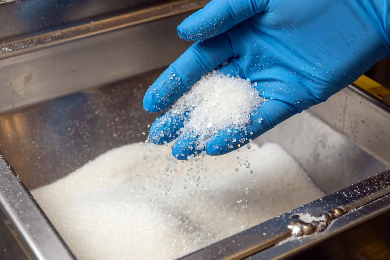 Refined white sugar crystals produced from sugarcane at a US sugar refinery